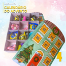 Caixa Calendário do Advento aberta com espaços decorados para pequenos presentes e mensagens diárias