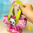 Detalhe frontal da caixa cesta de flores montada com recortes decorativos