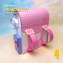 Detalhe superior da caixa mochila Hello Kitty com acabamento artesanal e cores suaves