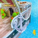 Detalhe frontal da caixa One Piece com recortes precisos e ilustrações dos personagens