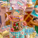 Cajas temáticas inspiradas en Alicia en el País de las Maravillas con colores vibrantes y detalles únicos