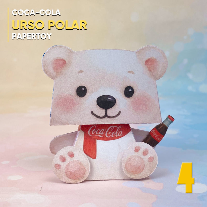 Papertoy Urso da Coca-Cola com design natalino e garrafa clássica em mãos, ideal para projetos criativos e decoração festiva